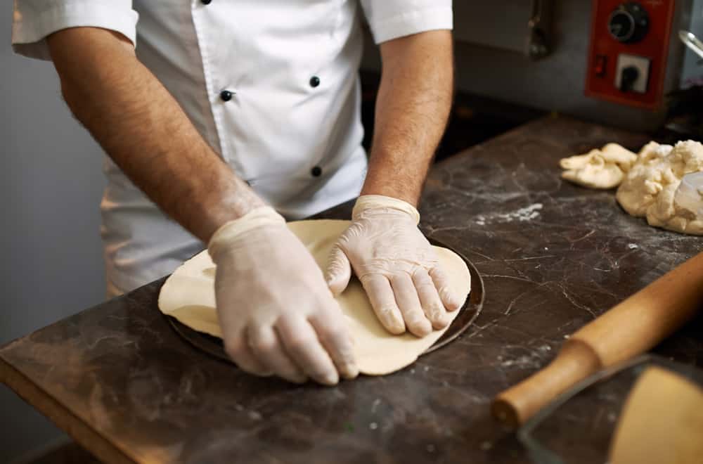 Roll the pizza dough