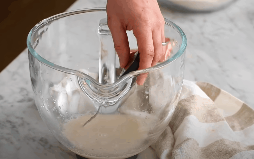 Dissolve sugar and yeast in water