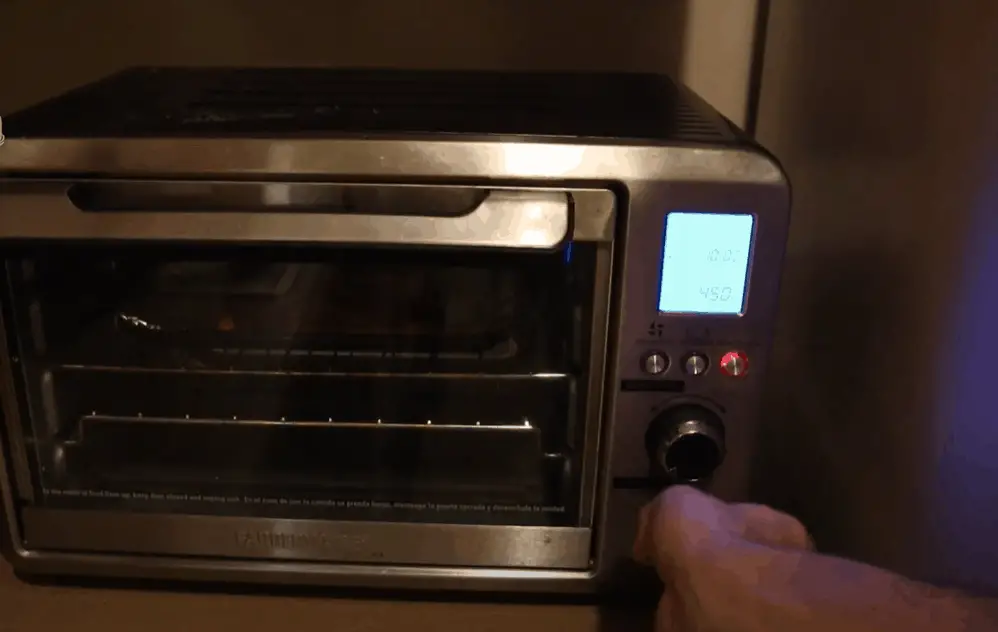 Let the toaster oven preheat