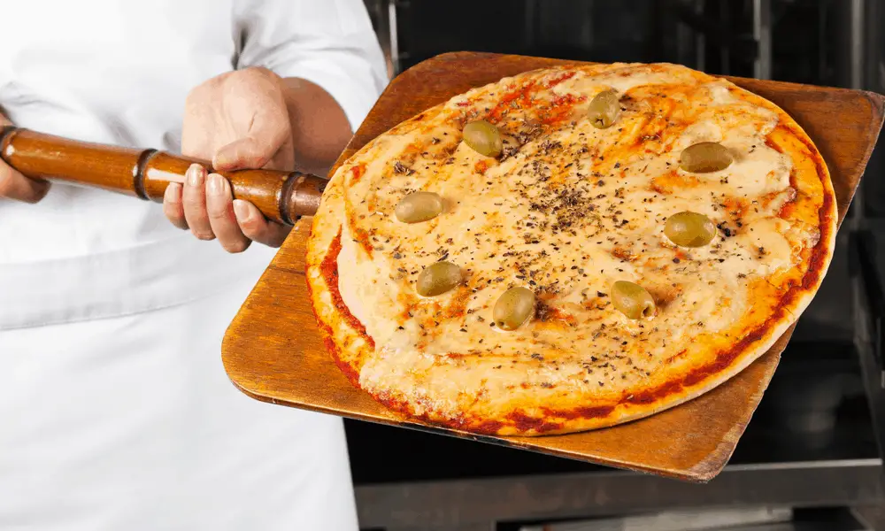 What Is a Pizza Peel Types, Using Tips & Maintenance