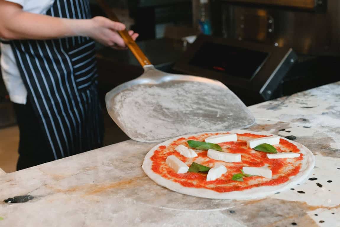 use Pizza Peel Transfer Pizza To A Stone