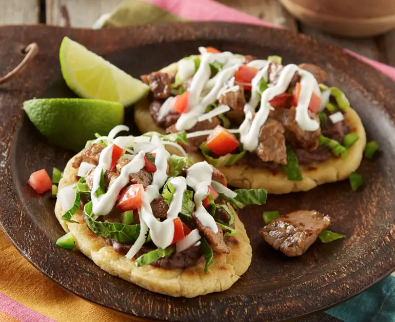 Huaraches With Beef Steak & Sour Cream