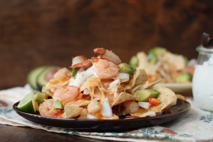 Shrimp Nachos With White Cheddar Sauce And Avocado Grapefruit Salsa