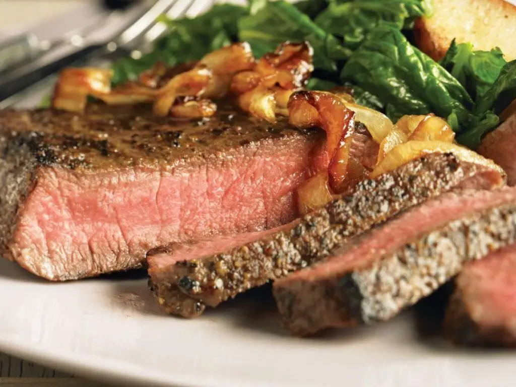 Grilled Pepper Steak with Caramelized Onions