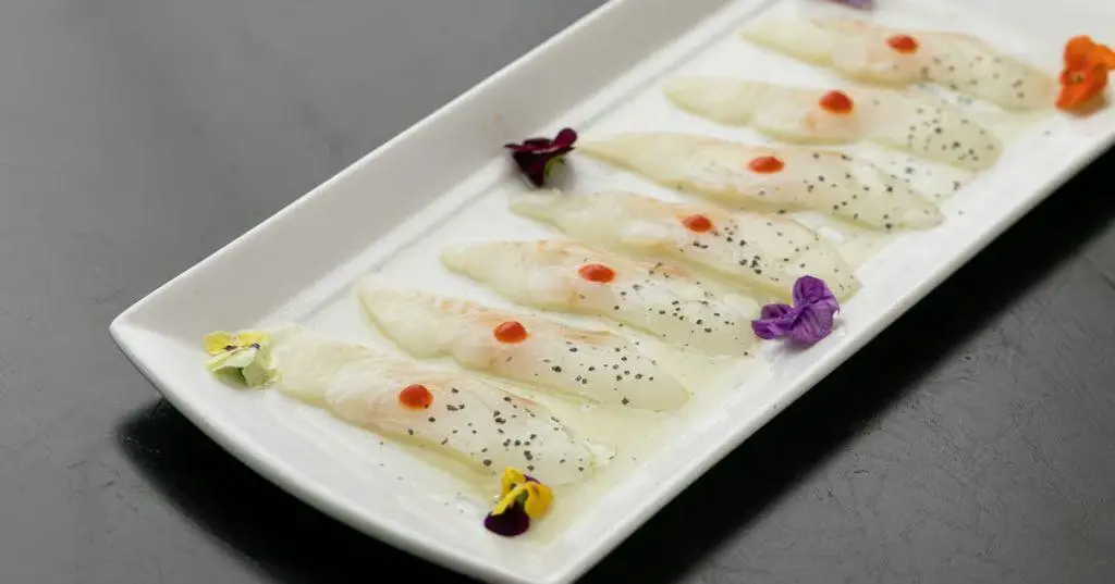 Halibut Carpaccio with Truffle Oil