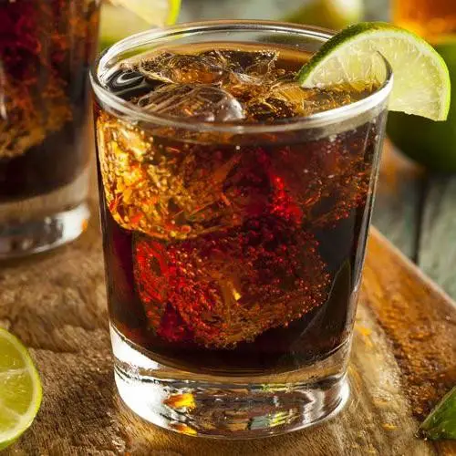 Rum and Coke with a Twist of Orange